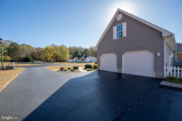 view of home's exterior with a garage