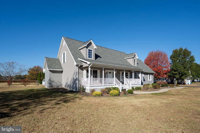 cape cod house featuring a porch and a front yard