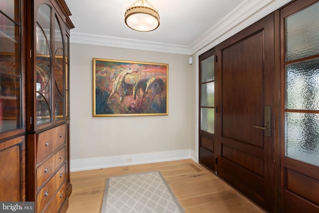 155 E Oakland Ave, Doylestown, PA 18901 - foyer with light wood-style floors, baseboards, and crown molding