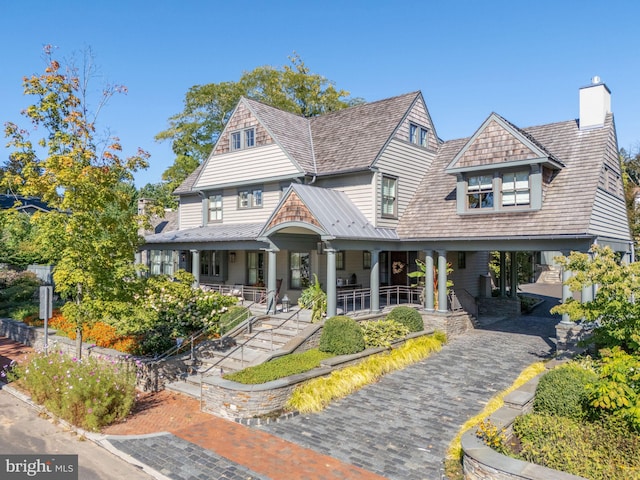 155 E Oakland Ave, Doylestown, PA 18901 - shingle-style home featuring covered porch, a carport, and a chimney