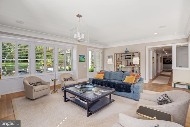 155 E Oakland Ave, Doylestown, PA 18901 - living area with crown molding, light wood-style flooring, a chandelier, baseboards, and recessed lighting