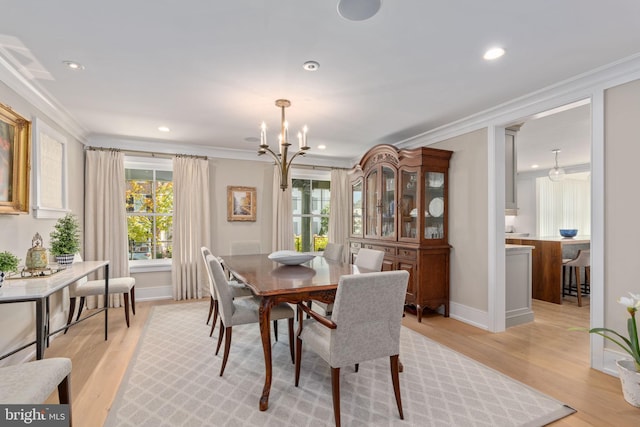 155 E Oakland Ave, Doylestown, PA 18901 - dining space featuring crown molding, light wood finished floors, recessed lighting, a chandelier, and baseboards