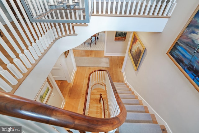 155 E Oakland Ave, Doylestown, PA 18901 - stairway featuring wood finished floors, baseboards, and a high ceiling