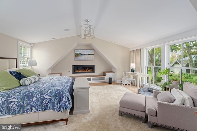 155 E Oakland Ave, Doylestown, PA 18901 - bedroom with lofted ceiling and a glass covered fireplace