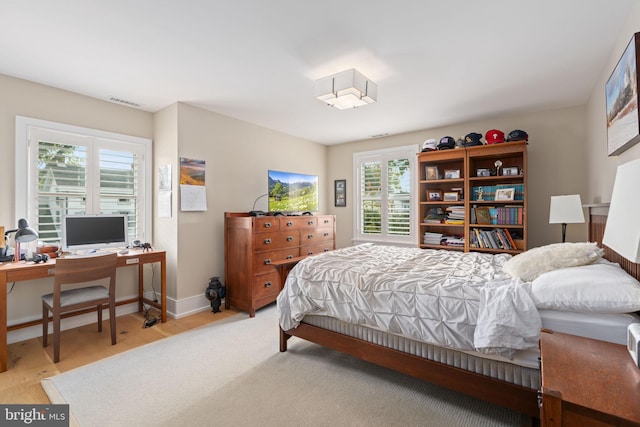 155 E Oakland Ave, Doylestown, PA 18901 - bedroom with an office area, wood finished floors, and baseboards
