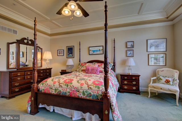 carpeted bedroom featuring ornamental molding and ceiling fan