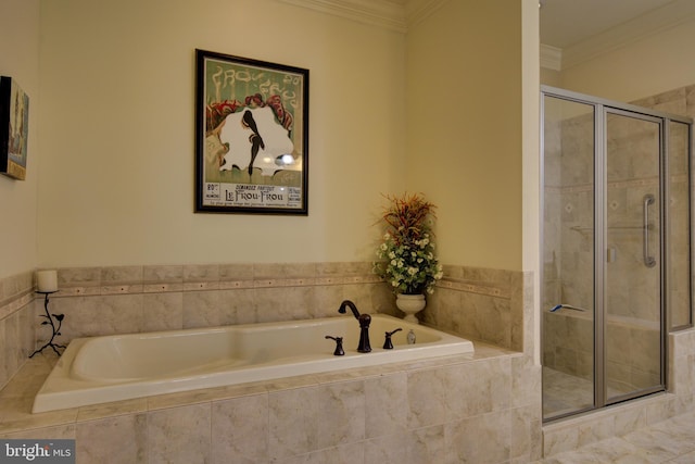 bathroom featuring shower with separate bathtub and ornamental molding