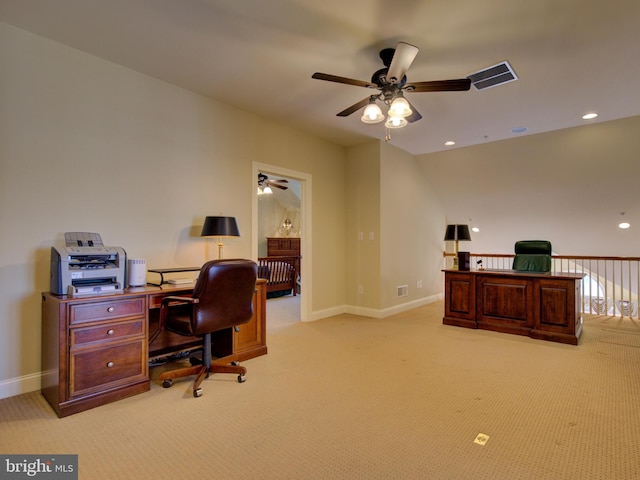 home office with light colored carpet and ceiling fan