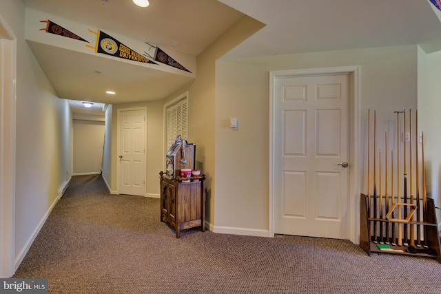 corridor featuring carpet floors