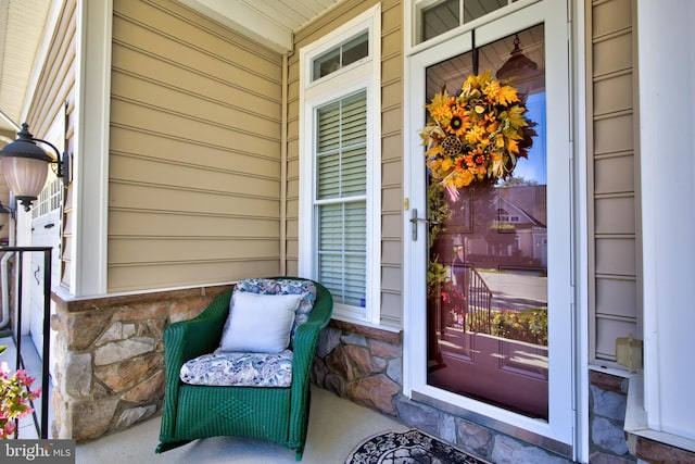 property entrance featuring covered porch