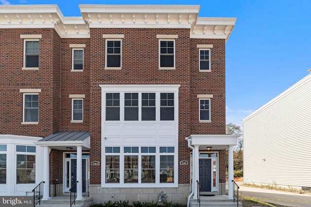 multi unit property featuring brick siding