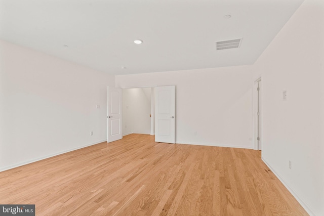 empty room with light wood-type flooring