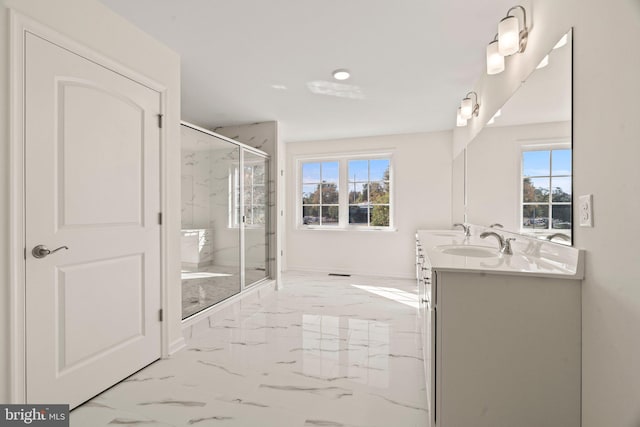 bathroom with vanity and walk in shower