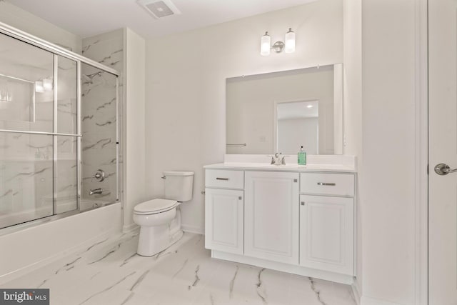 bathroom featuring toilet, combined bath / shower with glass door, visible vents, marble finish floor, and vanity
