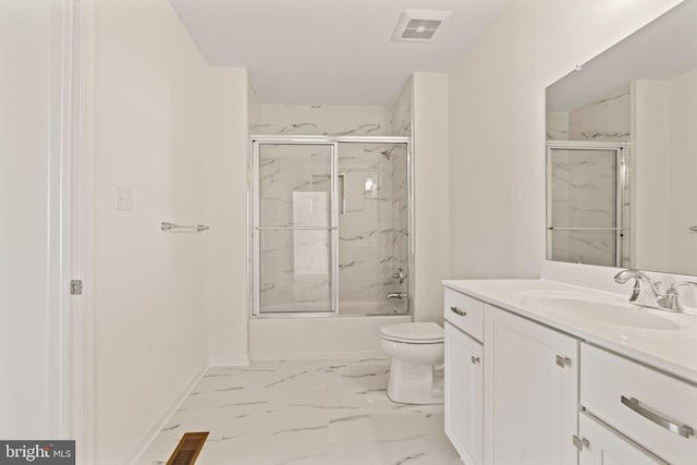 bathroom featuring toilet, shower / bath combination with glass door, visible vents, marble finish floor, and vanity