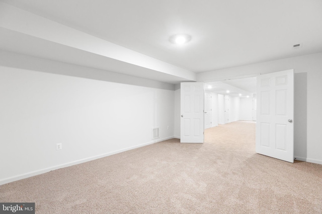 basement with light carpet