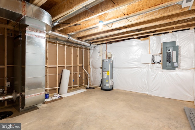 basement with electric water heater and electric panel