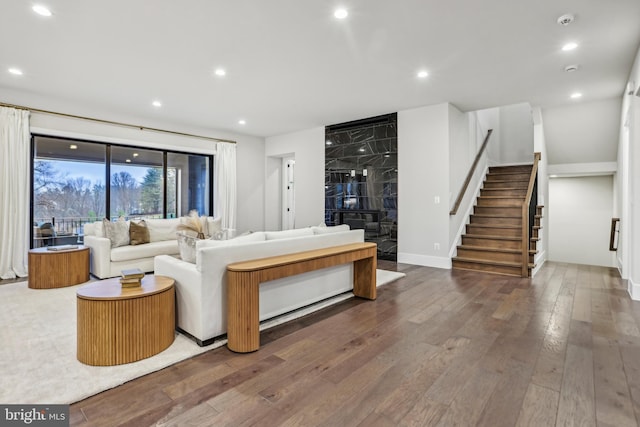 living room featuring dark wood-type flooring