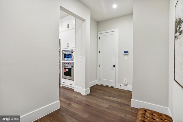 hall featuring dark hardwood / wood-style flooring