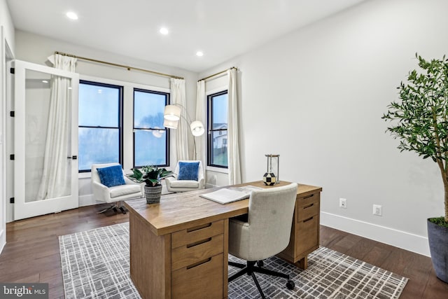 home office with dark wood-type flooring