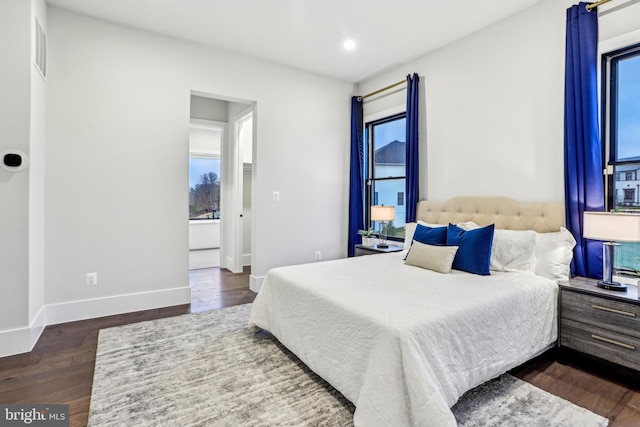 bedroom featuring dark hardwood / wood-style floors