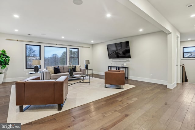 living room with light hardwood / wood-style floors