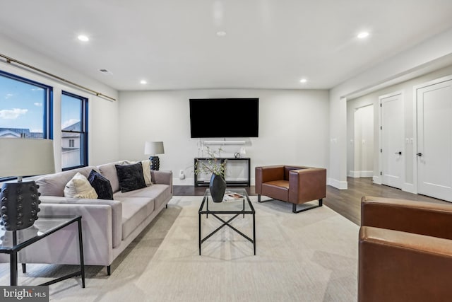 living room with light hardwood / wood-style floors