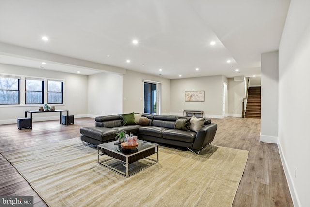 living room with light hardwood / wood-style floors