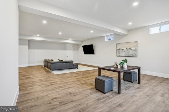 living room with light hardwood / wood-style floors