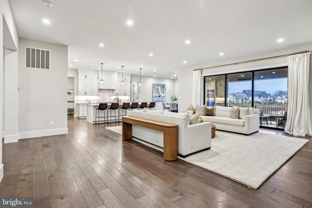 living room with wood-type flooring