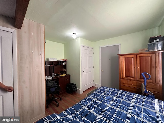 bedroom featuring hardwood / wood-style floors