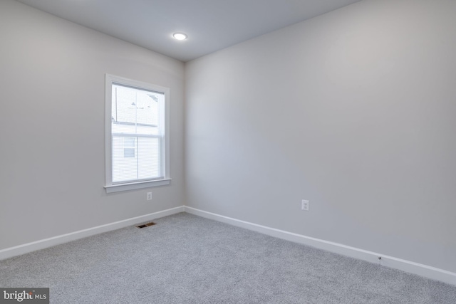 view of carpeted spare room