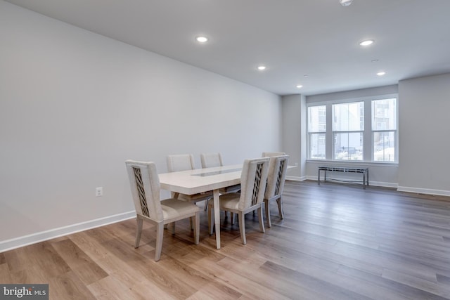 dining room featuring light hardwood / wood-style flooring