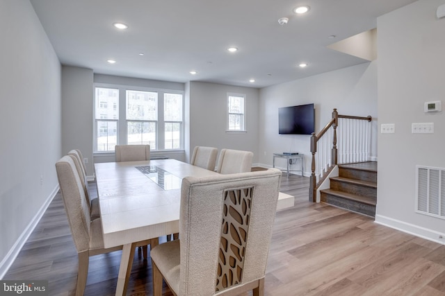 dining space featuring light hardwood / wood-style flooring