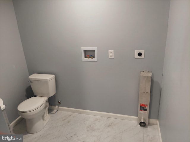 bathroom featuring toilet