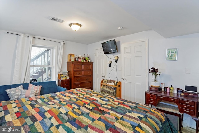 bedroom with visible vents