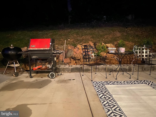 patio at night with a grill