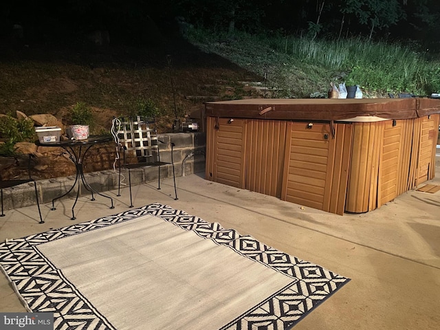 view of patio featuring a hot tub