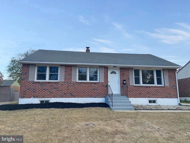 view of front facade with a front yard