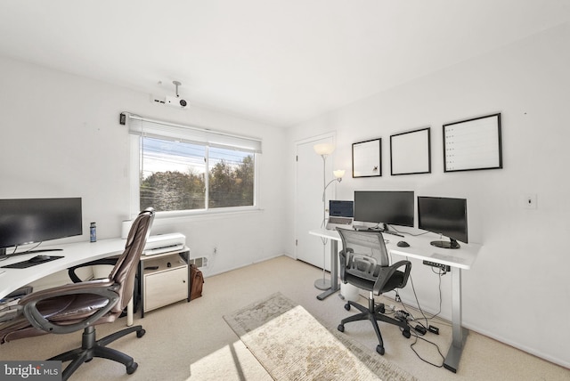 office with light colored carpet