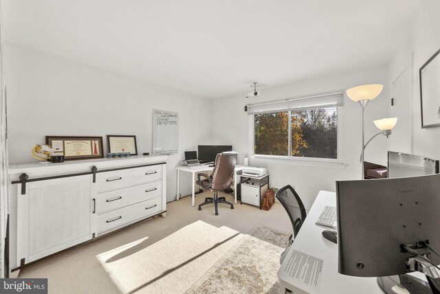 home office featuring light carpet