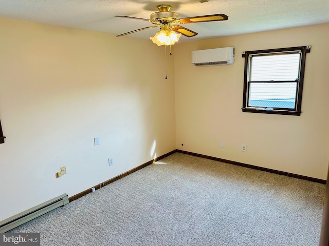 spare room with an AC wall unit, a baseboard heating unit, ceiling fan, and carpet flooring