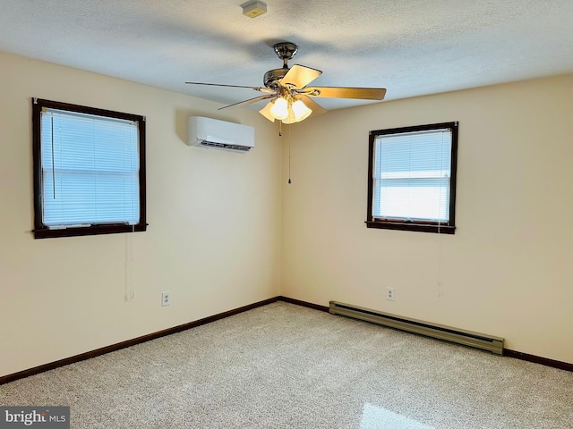 unfurnished room featuring ceiling fan, an AC wall unit, a textured ceiling, and baseboard heating