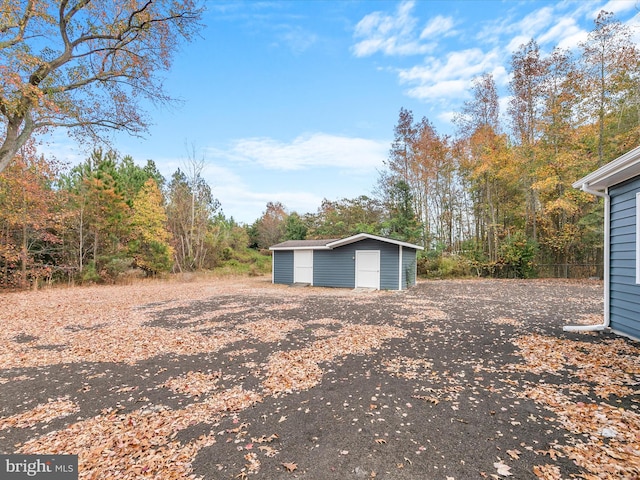 exterior space with a shed