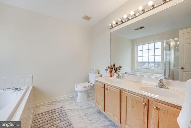 full bathroom with shower with separate bathtub, vanity, and toilet