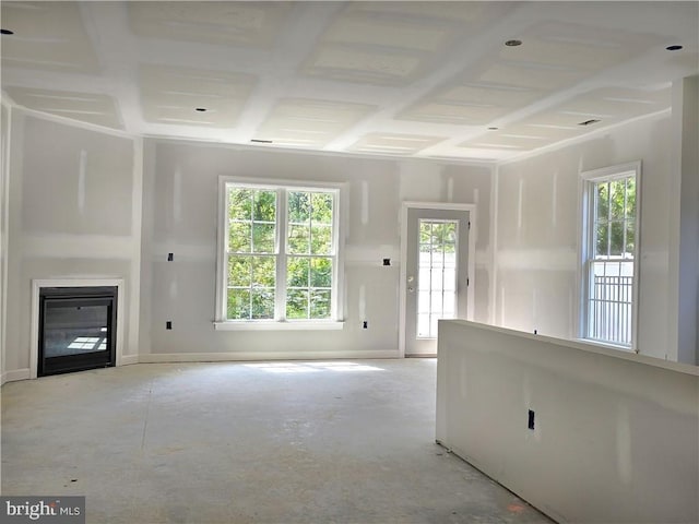 unfurnished living room featuring coffered ceiling