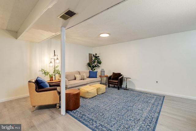 living room with hardwood / wood-style flooring