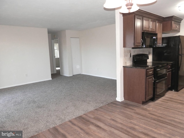 12 Dougherty Blvd Unit A5, Glen Mills, PA 19342 - kitchen with black appliances, ceiling fan, open floor plan, baseboards, and light wood-style floors