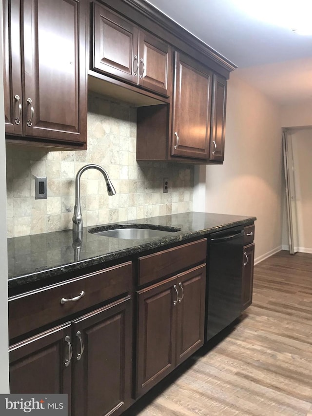 12 Dougherty Blvd Unit A5, Glen Mills, PA 19342 - kitchen with dark brown cabinets, backsplash, black dishwasher, and a sink