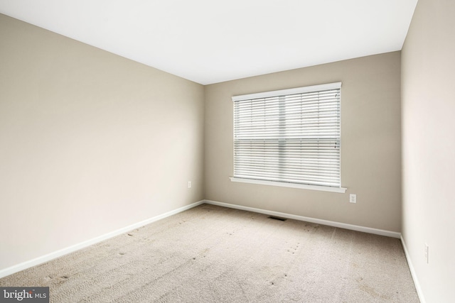 empty room with carpet floors